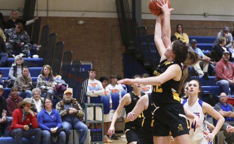 Medora DeNaeyer fights for a rebound at Gordon. Megan Andersen