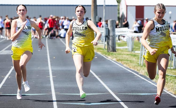 L-r: Allie Boyer, Kalli Licking and Ella Rice compete in the 100 meter dash prelims at Arnold last Friday. Megan Andersen
