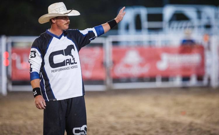 Zach Call acknowledges the crowd at the Buffalo Bill Rodeo in North Platte. The bullfighter retired from rodeo after the NorthPlatte event. Clay Guardipee, Rodeo Ready