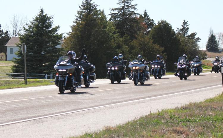 The Kyle Petty Charity Ride Across America makes their way into Mullen on Highway 2.