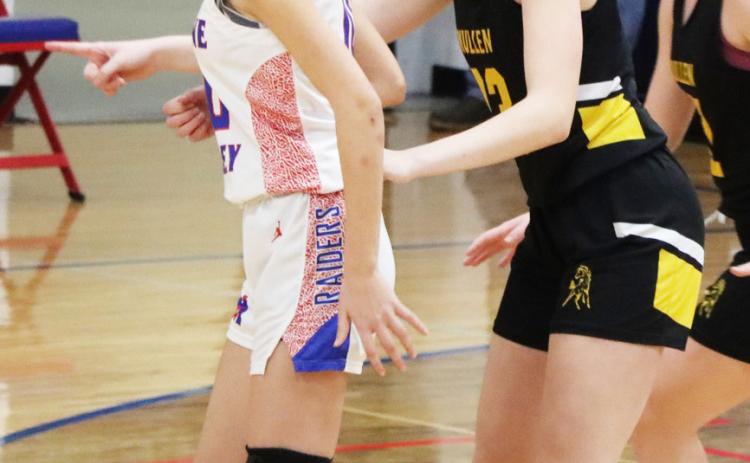 Chloe Newman plays defense at Medicine Valley. Sue Licking