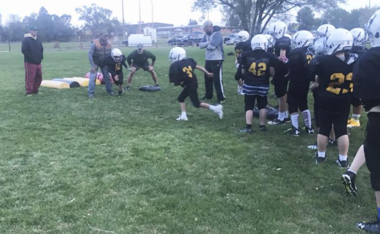 John Howell is guest coach for youth football team