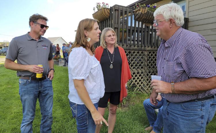 NC member Elizabeth Tegtmeier, North Platte, visits with host John Kraye. Brian Tegtmeier and NC President Brenda Masek listen in. Terri Licking
