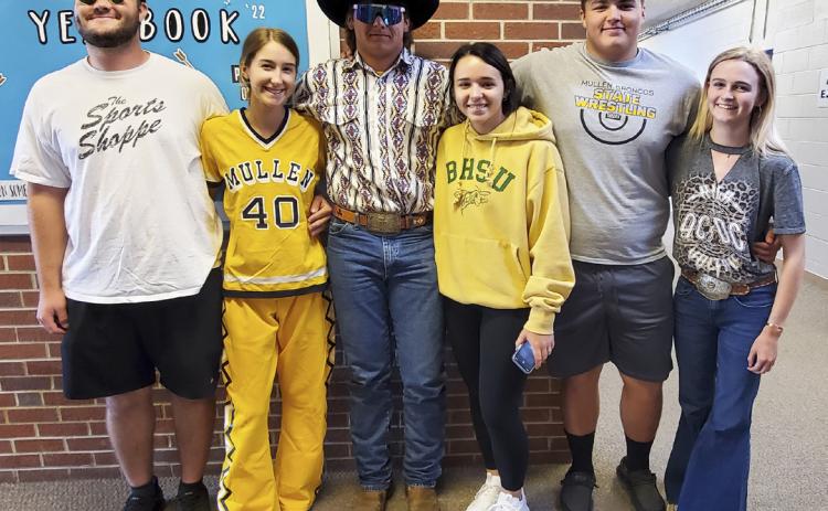 Dressed in the Tuesday Homecoming dress up day of “60’s, 70’s, 80’s &amp; 90’s” are the Homecoming court candidates, l-r: Tel Kvanvig, Whitney Jennings, Deacon DeNaeyer, Izabella Brown, Isaac Welch, Ashton Werth. Mike Kvanvig