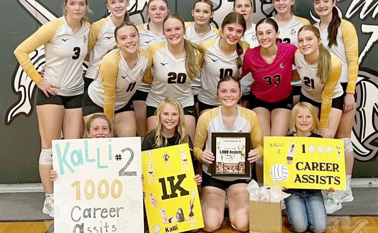 Lady Bronco sophomore setter Kalli Licking got her 1,000th assist in the sub-district final game last week. She is pictured with her teammates, back l-r: Medora DeNaeyer, Sydnee Cheever, Hayley Donohoe, Maggie Haesler, Brynne McCully, Chloe Newman, Jenna Donohoe. Middle: Izzy Hoyt, Emerson Thorberg, Ella Rice, Allie Boyer, Lola Wingebach. Front: Dailie Dent, Ayden Lee, Kalli, Fallon Lee. Sue Licking