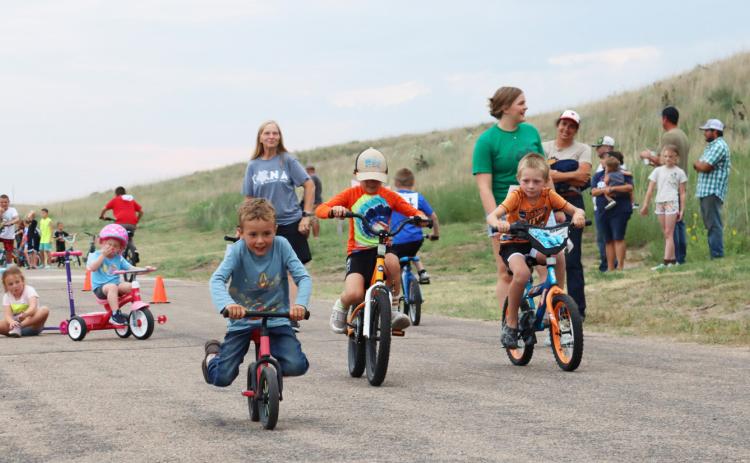 L-r: Burke Mundorf, Henry Svoboda and Hunter Paitz compete in the Bicycle Rodeo race event. Gerri Peterson