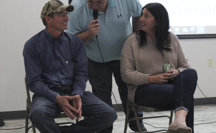 MC Bill Boyer draws out the suspense for Mike French and Shauna Donohoe who were both in the top 10 of the HCCF raffle Saturday night... he had Shauna’s ball in his hand. Gerri Peterson