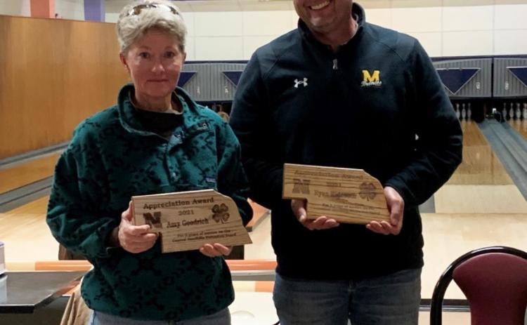 The Central Sandhills Area Extension Board met on Oct. 11 at the Hondo Lanes bowling alley in Mullen. Extension Board members Amy Goodrich of Blaine County and Ryan Ridenour of Hooker County were presented plaques honoring them for their 6 years of service as board members. courtesy photos