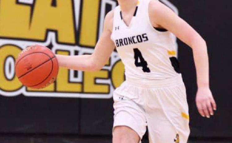 Alli Loughran brings the ball up the court in the MNAC semifinals game against Sandhills/Thedford last Thursday. Sue Licking