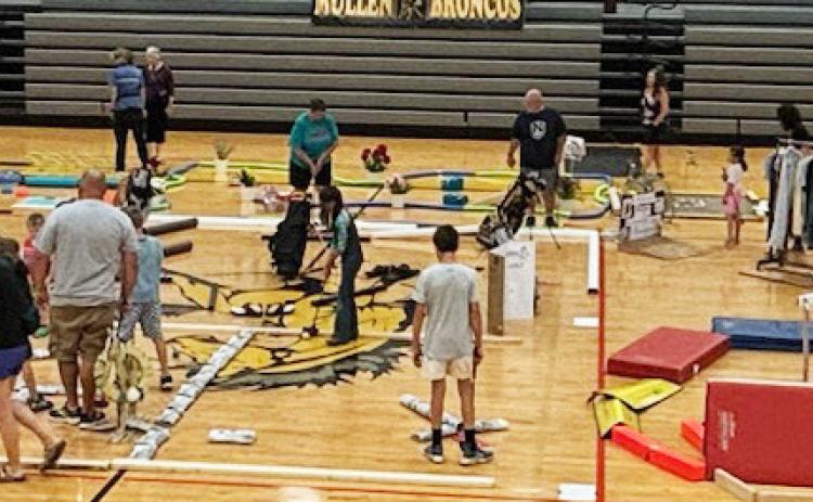 The creativity was endless at the 9-hole miniature golf course set up at the Hilltop Gym last Friday, June 7 during the alumni festivities. Mullen businesses out-did themselves.