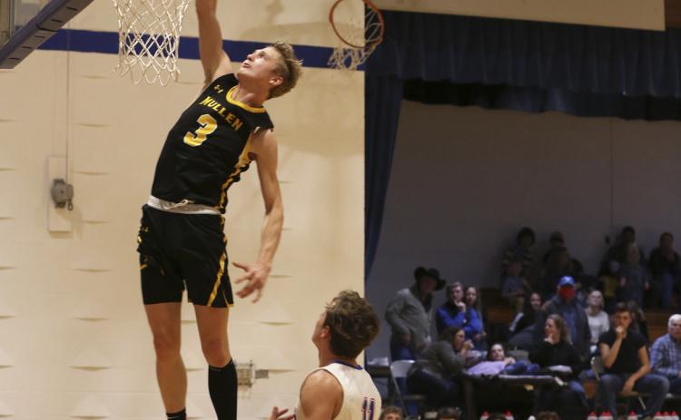Clayton Moore with a dunk at Arthur. Megan Andersen