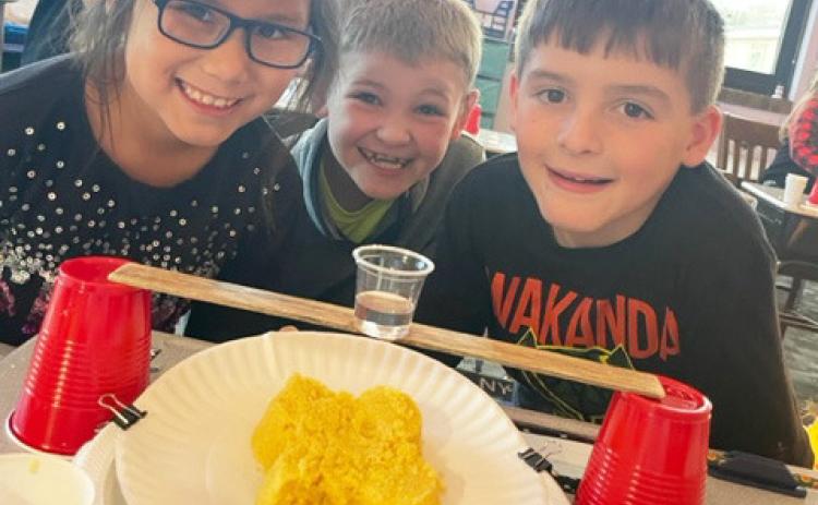 The Mullen second graders have been learning about erosion, the earth’s surface and landforms. They investigated what causes a canyon and how to stop landslides. Pictured l-r: Natalee Walker, Tripp Jewell, Zach Hicks. Emily Brown