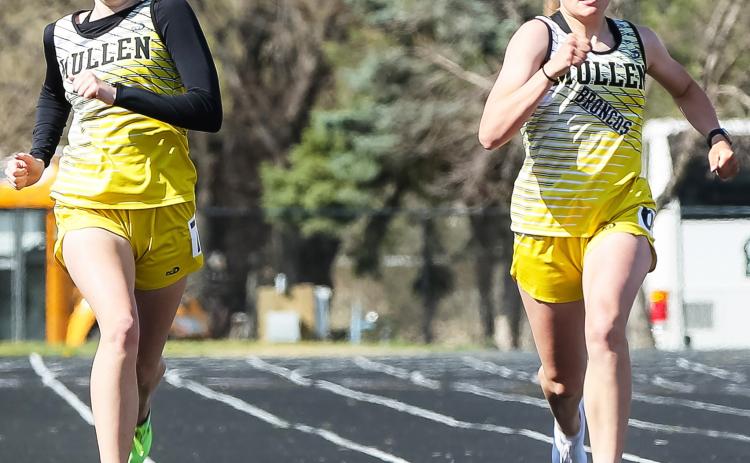 Freshmen Chloe Newman (left) and Brynne McCully finished 5th and 6th in both the 200 (pictured) and the 400 last week. Megan Andersen