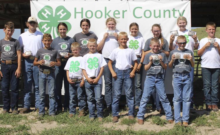 4-Hers who showed livestock are pictured back, l-r: Hunter Brown, Daniel Wright, Izabella Brown, Fayth Brown, Hayley Donohoe, Kalli Licking, Hope Miller, Faith Miller, Hayden Deibler. Front: Gunner Brown, Ryden Ourada, Weston Ourada, Teal Peterson, Duke Miller, Oakes Miller. Gerri Peterson