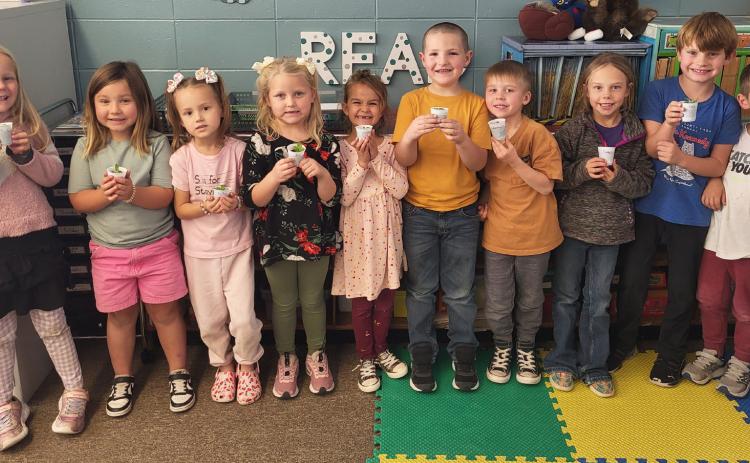 Mrs. Jewell and the 7th grade girls brought the kindergartners baby plants and taught them about plants for their plant unit. Pictured l-r: Harper Barnes, Quinley Schmid, Stevie Johnson, Violet Stichka, Josey Boland, Kane Simmons, Martin Connealy, Emerson Phipps, Clay Cribelli, Johnny Phillips. Leanne DeKay