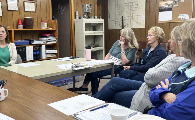 Elizabeth Tegtmeier (left) speaks at the Hooker County GOP meeting last month. Barb McIntosh