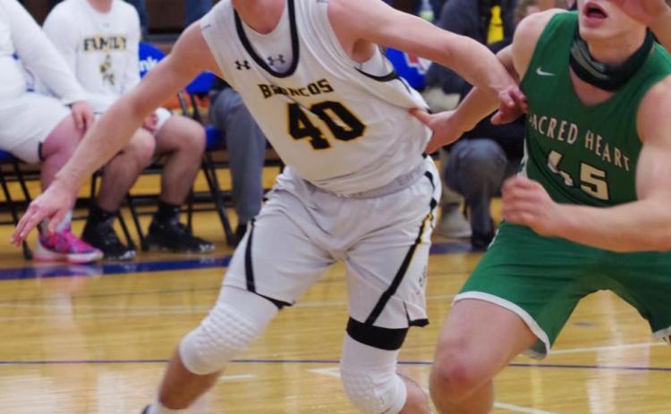 Bryce McIntosh goes for a rebound last Wednesday. Barb McIntosh