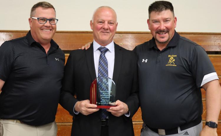 MHS Principal Mike Kvanvig (left) and MPS Superintendant Chris Kuncl (right) honoring retiring Activities Director Phil Hoyt.