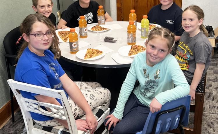 Pictured clockwise around the table from the top left: Grady Phipps, Cylas Dent, Lane Brown, Kinley Crisp, Aislynn Connealy, Taylor Cash. Brett Mauler
