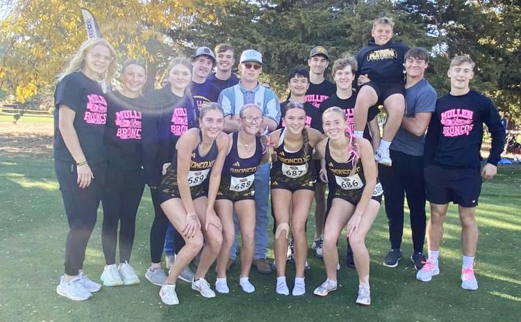The Lady Broncos placed 6th out of 17 Class D girls cross country teams competing at state last week. They are pictured surrounded by their peers who were in Kearney cheering them on. Megan Andersen