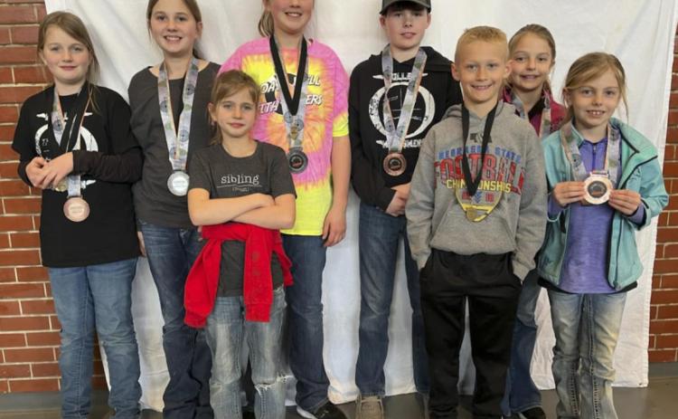 Mullen Marksmen competing in Alliance, pictured l-r: Adelyn O’Brien, Jessa O’Brien, Rainne O’Brien, Hannah O’Brien, Cian Connealy, Teal Peterson, Kaisley Phipps, Kendall Phipps. Not pictured: Brandt Mundorf, Colin Connealy. Gerri Peterson