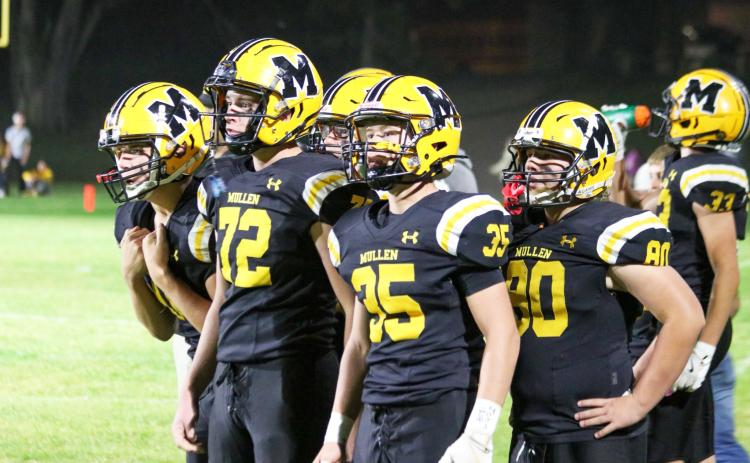 Players on the sideline intently watch the action last Thursday night, l-r: Colby Kessler, Hayden Morrison, Jack Coble, Cody Walker and DJ Coetzee. Carolee Brown Photography