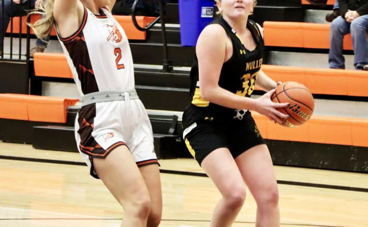 Hayley Donohoe looks to the basket at Ogallala last Friday. Sue Licking