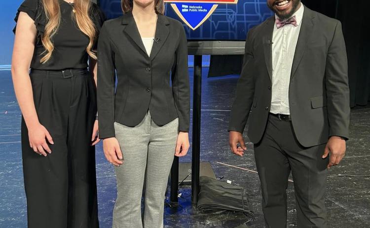 L-r: MHS speech coach Kyler Horn, Ashlyn Simonson and DWayne Taylor. Liza Simonson