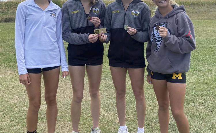 MNAC cross country team champions, l-r: Ady Hampton, Harper Andersen, Peyton Paxton, Riley Hegland. Janie Kuncl