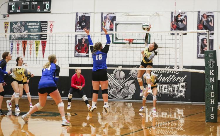 Ella Rice with an attack in subdistrict action at Thedford. Megan Andersen