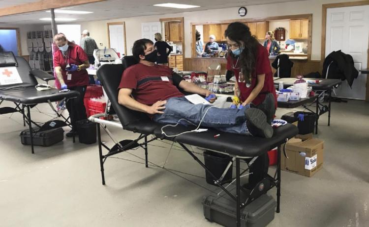 Gerri Peterson Ben Hart waits to donate blood on Monday.