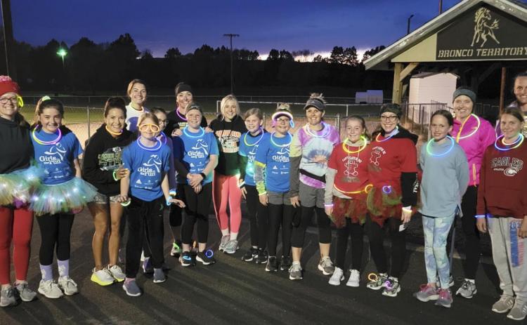 Girls on the Run participants with their Buddy Runners last Thursday, l-r: Mellissa Donohoe, Jenna Donohoe, Janie Kuncl, Lola Wingebach, Molly Paxton, Abby Gracey, Kendra Thorberg, Emerson Thorberg, Lacie Hanks, Chloe Newman, Riley Hegland, Ashley Hegland, Kassidy Cheever, Joni Cheever, Taylor Moore, Sarah Hardin, Brynne McCully, Brooke McCully. Bri Moore