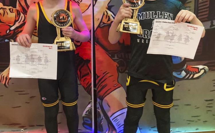 4 youth wrestling champions on Sunday
