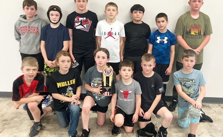 Most of the Mullen youth wrestlers who competed in Sutherland with their team trophy. Back l-r: Tuff Pettit, Tripp Jewell, Cylas Dent, Kyler Marsh, Lorenzo Gonzalez, Tru Mundorf, Caleb Deibler. Front: Killian Kearns, Bryndal Greeley, Dailie Dent, Brek Dent, Trent Cox, Tate Phillips. Steven Dent
