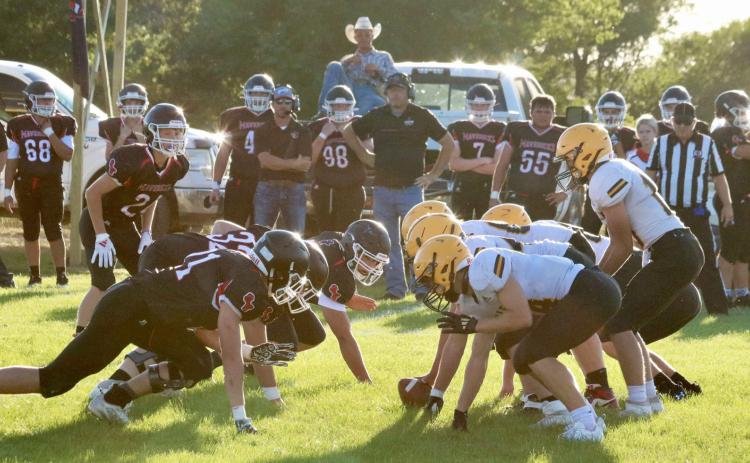 The Broncos wait for quarterback Jaylon Forsen to call the play at Tryon last Friday. Carolee Brown