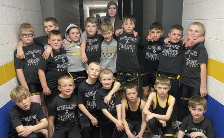 Mullen youth wrestlers competing at the West Holt Duals are pictured back, l-r: Collin Donohoe, Justin Kraus, Carson Hegland, Colin Connealy, Colby Kessler, Cody Walker, Jason Kraus, Bo Pettit, Jr., Gunner Brown, Bronx Burney, Jedd Kraus. Front: Gus Wingebach, Caleb Deibler, Weston Ourada, Ryden Ourada, Cylas Dent, Kyler Marsh, Tuff Pettit. Steven Dent