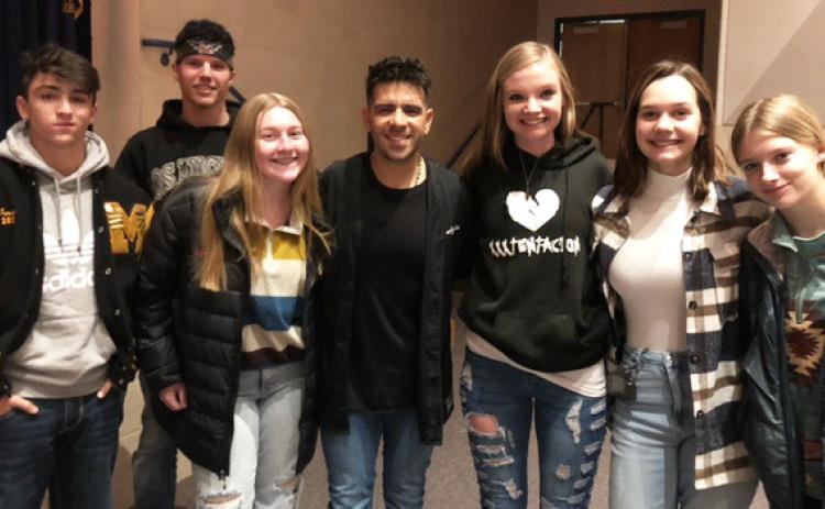 L-r: Jeffery Forsen, Chase Rundback, Samantha Cheever, singer Edgar René, Kierstin Pike, Ashlyn Simonson, Erika Massey.
