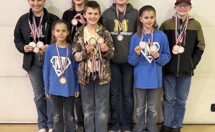Mullen Marksmen medaling at Mitchell are pictured back, l-r: Hope Miller, Adelyn O’Brien, Jessa O’Brien, Oakes Miller. Front: Aleah O’Brien, Ransom O’Brien, Rainne O’Brien. Not pictured: Zach Hicks. Tami Miller