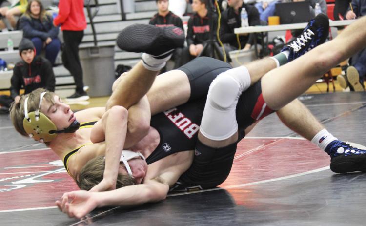 Eli Paxton in action last Saturday at Sutherland, where he earned his 100th career pin. Kris Forsen
