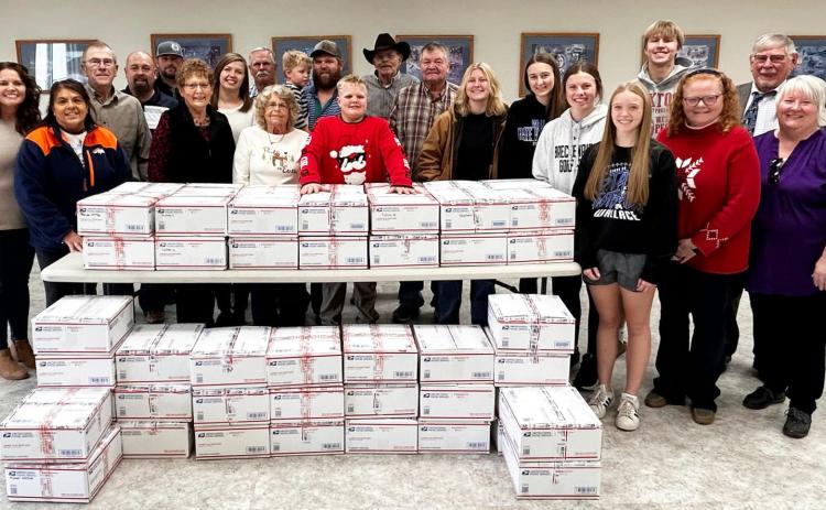 Mullen residents will recognize a couple familiar faces on the right hand side of this photo - Pastors Bill and Shanon Williams who helped pack this shipment of Big Red Battlefield Boxes. courtesy photo