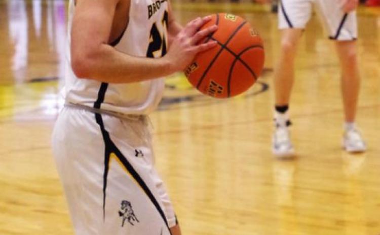 Barb McIntosh Samuel Coble looks to pass to a teammate last Friday.