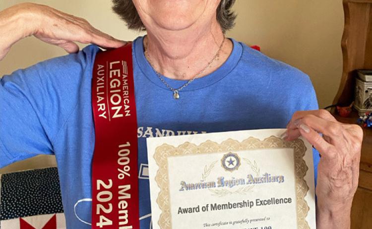 American Legion Auxiliary Unit 109 Membership Chairman Mary Lou Harding with awards received at State Department Convention. Eva Crawford