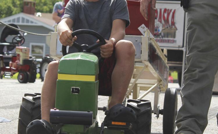 Cooper Ourada competes in the Pedal Tractor Pull. Gerri Peterson
