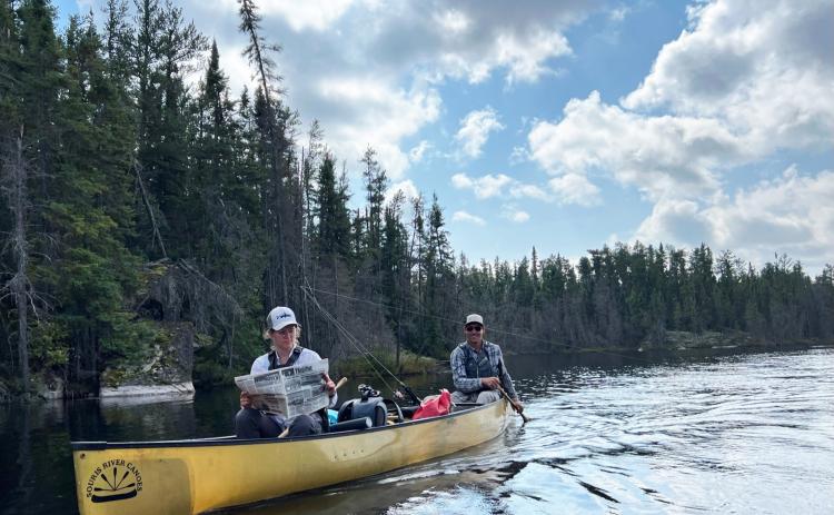 Colby and Amanda Osborn took the Tribune with them on their nine day canoe trip through Woodland Caribou Provincial Park in Ontario, Canada.