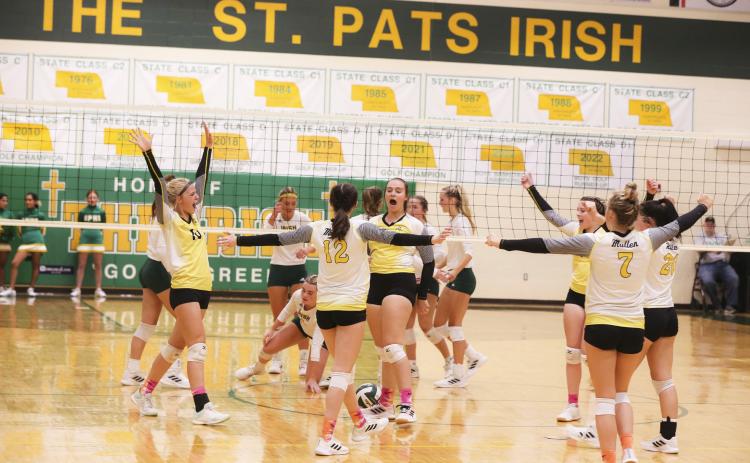 The Lady Broncos celebrate a point last Tuesday at North Platte St. Pats, l-r: Tierston Moore, Allie Boyer, Jadyn Andersen, Izzy Hoyt, Lauren Schoonveld, Bella Brown. Megan Andersen