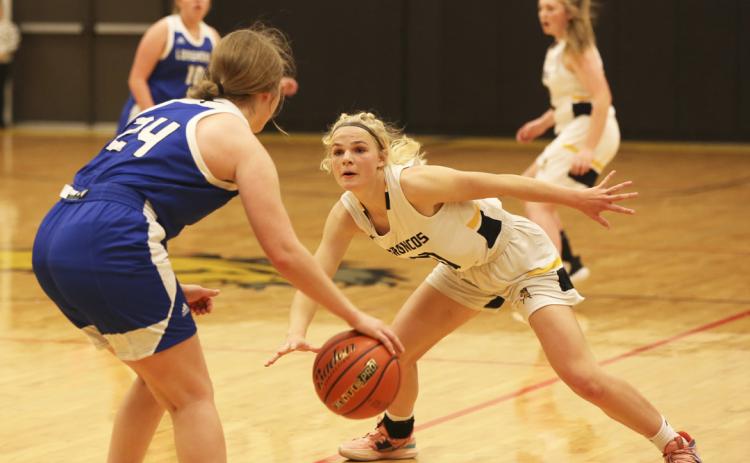 Tierston Moore plays defense against Hyannis last week. Megan Andersen