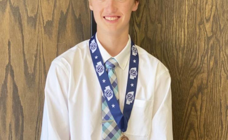Alex Moore earns first ever MHS
