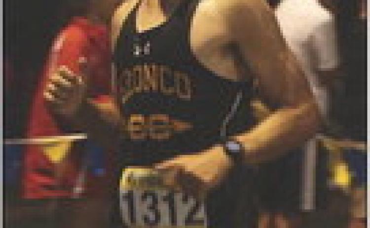 Senior Kyle Finney competing in the Augustana Twilight Meet. Megan Andersen