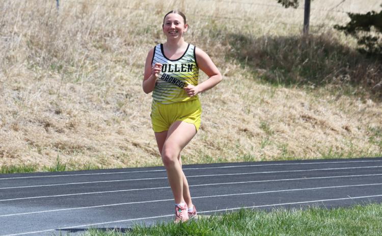 When a Mullen Bronco mom yelled, “Smile! Here’s the camera!” during the 3200 last Friday at MNAC, Hope Miller did just that! Gerri Peterson