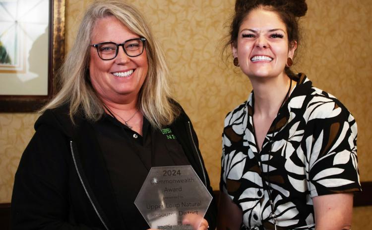 ULNRD General Manager Anna Baum (left) accepts the award. courtesy photo